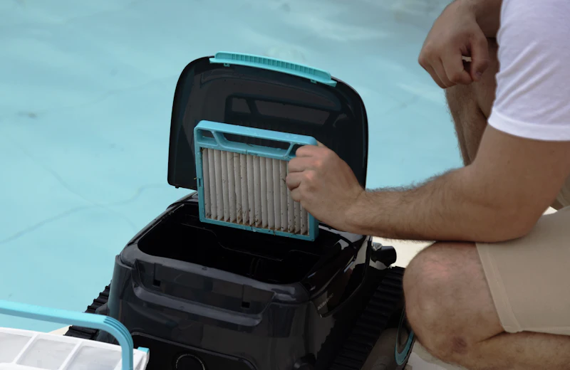 Technician cleaning a water purifier filter element